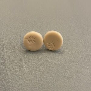 Cream circular earrings